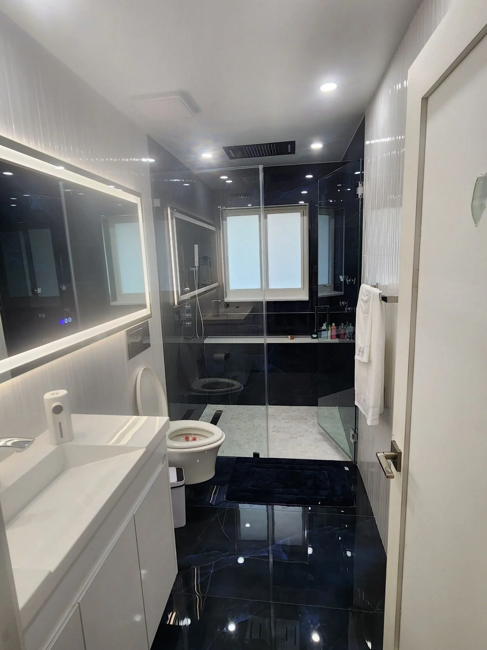Modern bathroom renovation Miami blue white