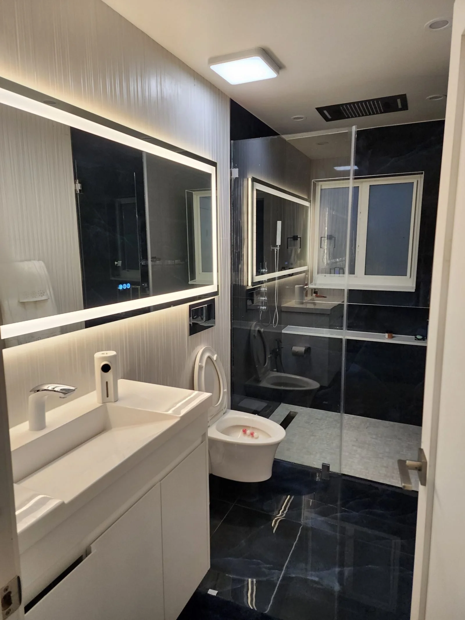 Modern bathroom renovation Miami blue white